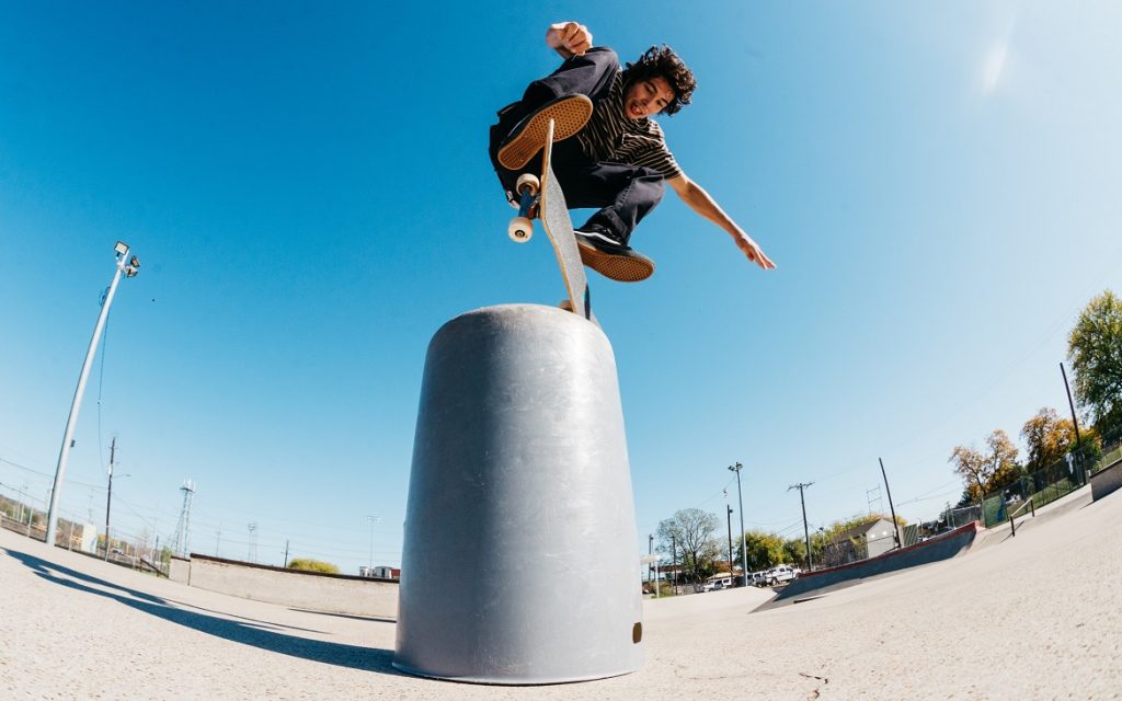 Guy Doing a Trick on Skateboard