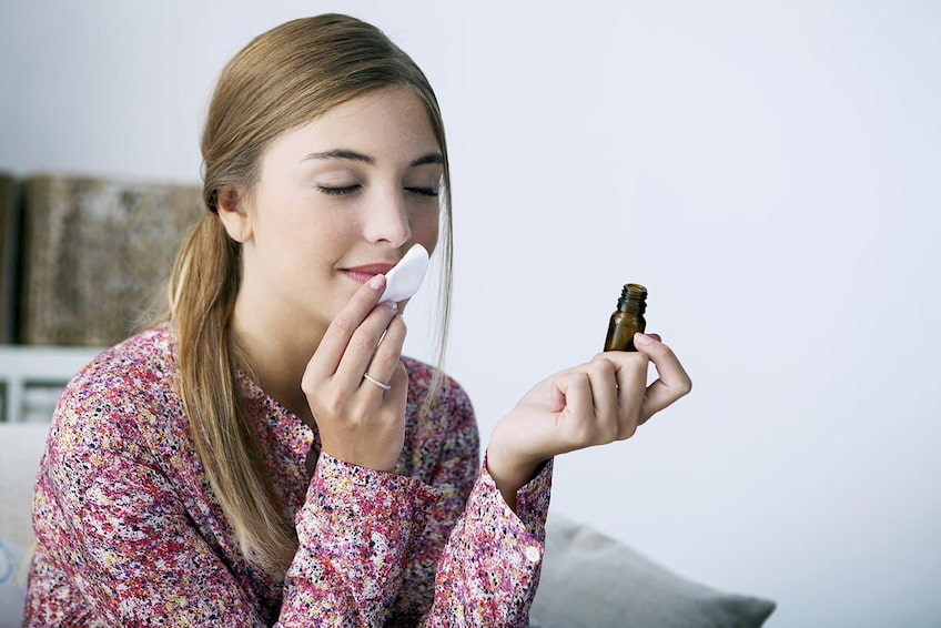 smelling-essential-oils
