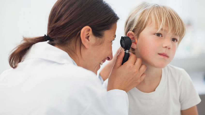 doctor-checking-kid-ear