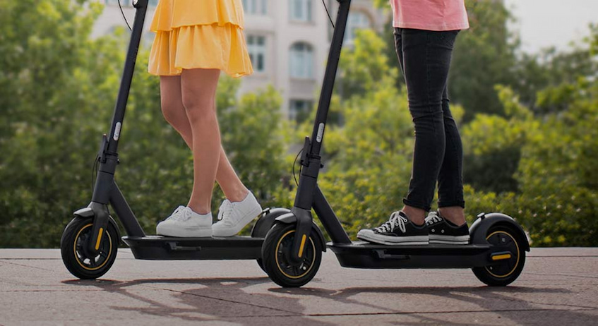 couple on electric scooters