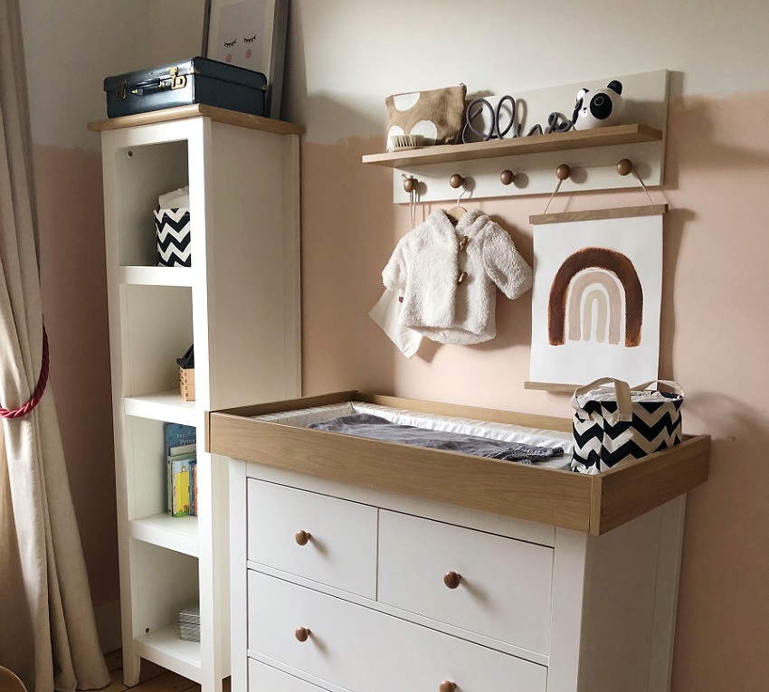 picture of a baby dresser in a baby room