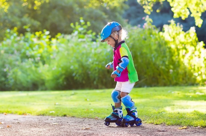 picture of a kid riding roller skates in the park