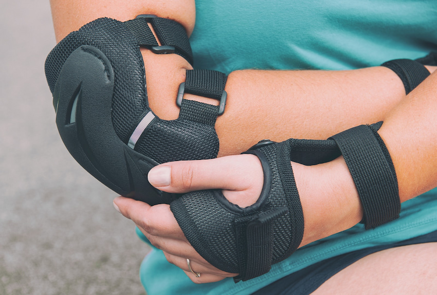 girl wearing skateboard elbow pads