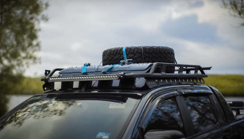 Roof rack with tire on it